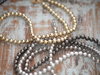 Taschenkette Perlen gold/silber/schwarz